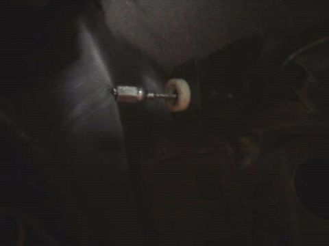 1996 Ford Bronco - Close-up of a drill bit with a wheel, likely for a repair or modification.