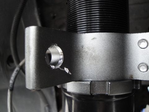 1995 Ford Taurus - This image shows a close-up of a coilover suspension component, likely a modified part for a vehicle.