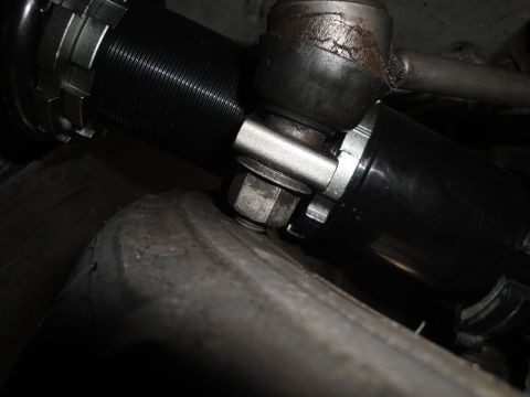 1995 Ford Taurus - Close-up view of a coilover suspension component, likely part of an aftermarket upgrade.