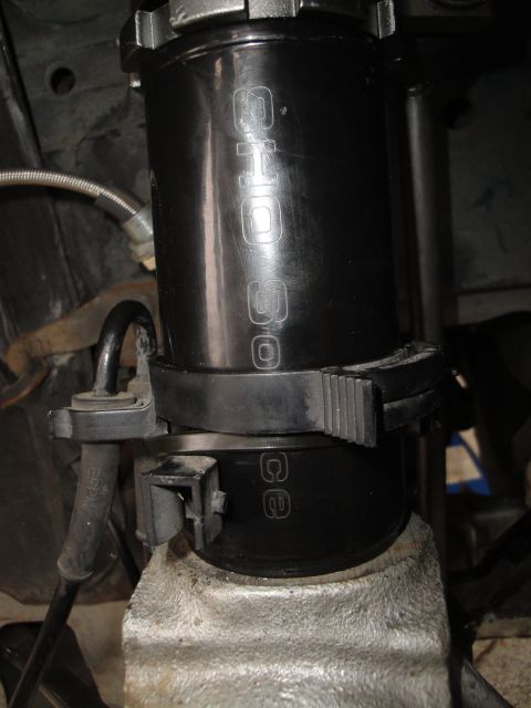 1995 Ford Taurus - Close-up of a coilover shock absorber, possibly for a Ford SHO model.