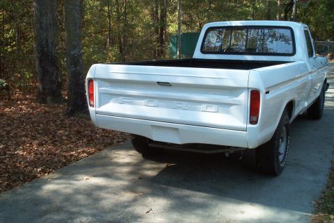 1992 Ford Bronco - The tailgate displays the 'FORD' lettering, and the taillights are vertical.