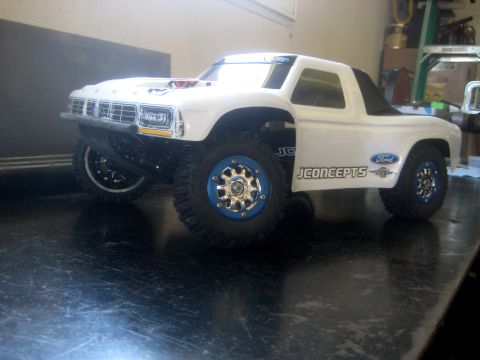 1996 Ford Bronco - RC car body with JCONCEPTS and Ford branding, resembling an older Bronco model.