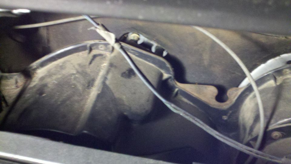 close-up of vehicle interior ductwork with wires and cables