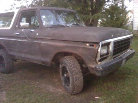 1979 Ford Bronco - This 1979 Ford Bronco is seen from a 3q-front angle, showing its brown body and white removable top.