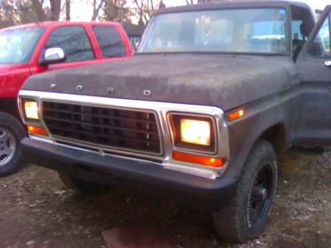 1979 Ford Bronco - Front view of a 1979 Ford Bronco showing its grille and headlights.