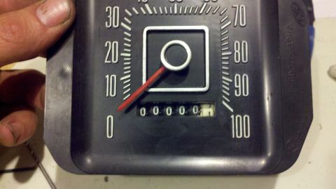 1978 Ford Bronco - Close-up of a 1978 Ford Bronco speedometer with the odometer reading 00000.1.