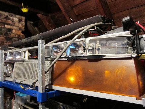 1991 Ford LTD Crown Victoria - An emergency light bar, likely from a police or fire vehicle, is stored on a shelf.
