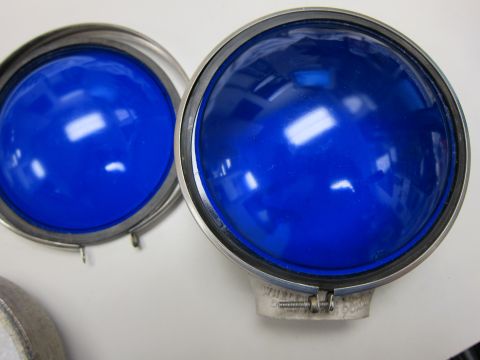 1991 Ford LTD Crown Victoria - Close-up view of two blue dome lights, possibly for emergency vehicles.