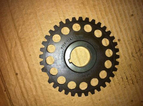 1998 Ford Crown Victoria - A close-up view of a timing gear, identified by the part number F2LE-12A227-BB.