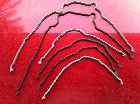 1998 Ford Crown Victoria - A collection of engine gaskets are shown on a red background.