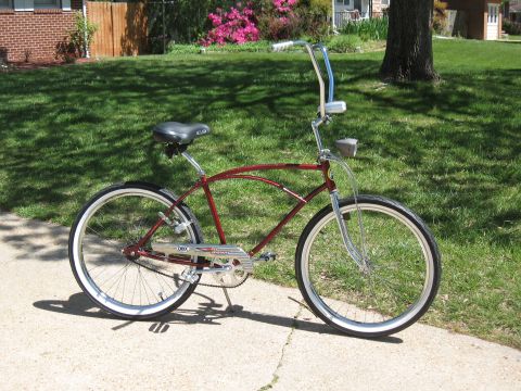 1994 Ford Bronco - Cruiser bicycle with whitewall tires and chrome accents sits on a paved path.