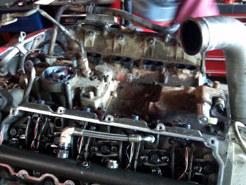 1993 Ford F-150 - Close-up view of an engine's internal components, including the valve train and cylinder head.
