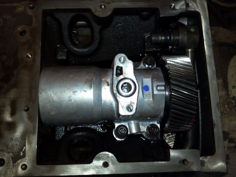 1993 Ford F-150 - Internal view of a truck's transmission, showing gears and a pump mechanism.