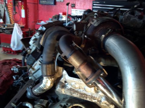 1993 Ford F-150 - Turbocharger and exhaust manifold assembly, likely from a truck or heavy equipment.