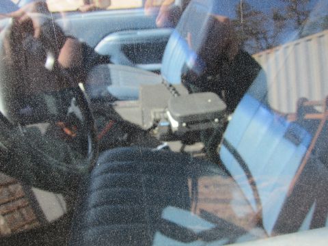 1991 Ford Crown Victoria LTD - Interior view of a car, showing the steering wheel, dashboard, and seats.