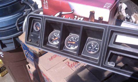 1978 Ford Bronco - Dashboard gauge cluster with several gauges, possibly from an older truck or SUV.