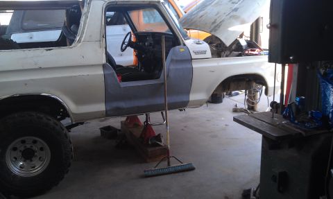 1978 Ford Bronco - This 1978 Ford Bronco is in a workshop, appearing to be undergoing repairs or restoration.