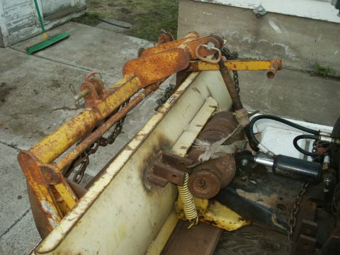 1966 Ford Bronco - This is a rusted tractor loader attachment, not a 1966 Ford Bronco.