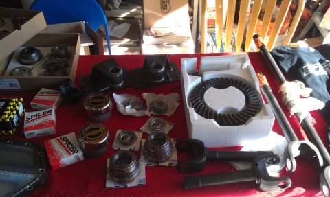 1978 Ford Bronco - Collection of Spicer differential and axle parts, including a ring and pinion gear set and hub assemblies.