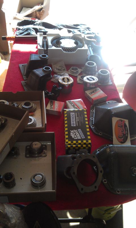1978 Ford Bronco - Collection of Dana 60 differential parts, a ring gear, bearings, and various Spicer branded components.