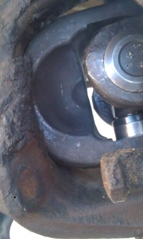 1978 Ford Bronco - Detail of a Dana 60 axle component, likely a differential housing, showing a U-joint connection.