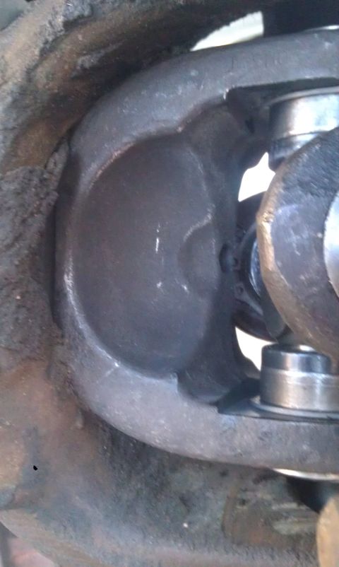 1978 Ford Bronco - Close-up view of a driveshaft universal joint, likely from a 4x4 vehicle.