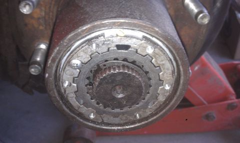 1978 Ford Bronco - A close-up view of a vehicle's hub assembly, showing its internal geared mechanism.