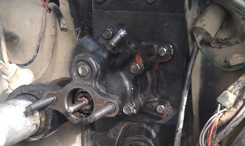 1978 Ford Bronco - This is a close-up view of a hydroboost brake booster assembly, showing its mechanical components and connections.