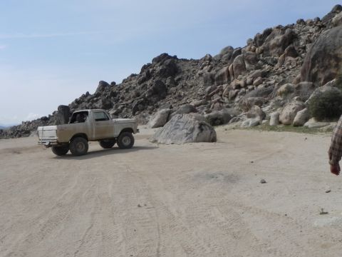 1978 Ford Bronco - Off-road scene with a 1977 Ford F-150 pickup truck on a dirt track.
