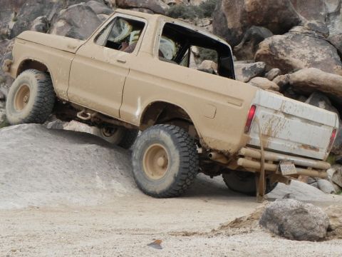 1978 Ford Bronco - 1978 Ford Bronco navigating a challenging rocky trail in Johnson Valley.
