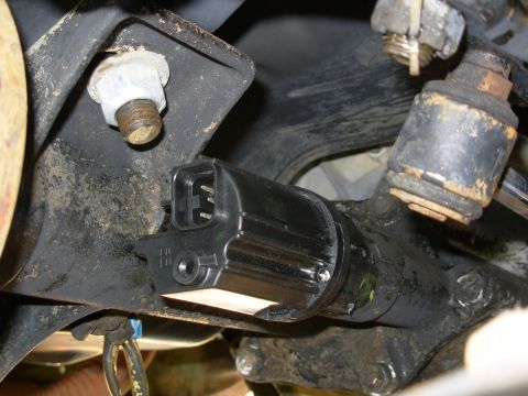 1997 Chevrolet Silverado 3500 - The body of the actuator is VERY close to the axle housing, but mine had no interference. It took some effort to get the threads started.