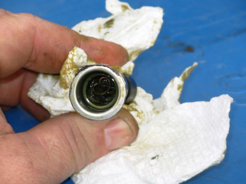 1997 Chevrolet Silverado 3500 - Just for curiousity, I cut the old actuator open. My best guess is that the oil leaked out, allowing the heater filament to overheat & melt…