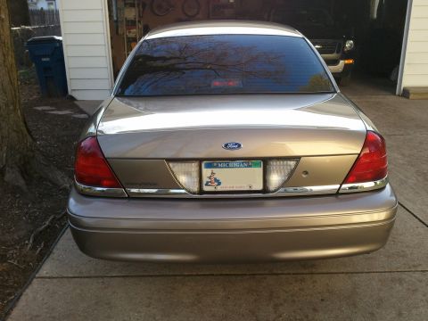 2007 Ford Crown Victoria - Rear view of a 2007 Ford Crown Victoria with a Michigan license plate.