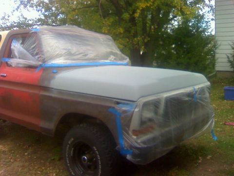 1979 Ford Bronco - This classic Ford Bronco is being prepped for a paint job, with its front end covered for protection.