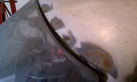 1969 Ford Mustang - Few small surface rust patches along the windshield on the driver side.