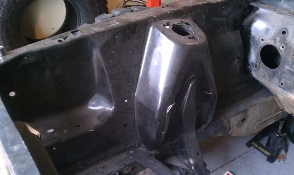 Passenger side inner fenders.  All three panels have been replaced.