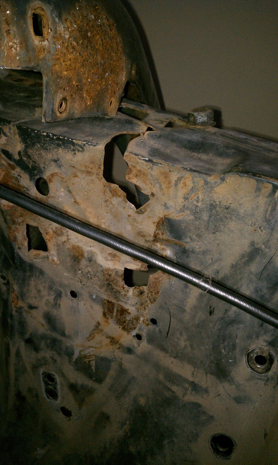 Driver side inner fender.  This is the panel between the shock tower and the firewall.  Here you can see why it needs to be replaced.  I do have the replacement panel for this.