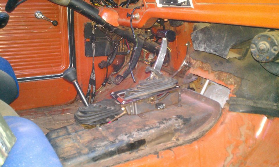 Truck interior with dual shifters and orange trim