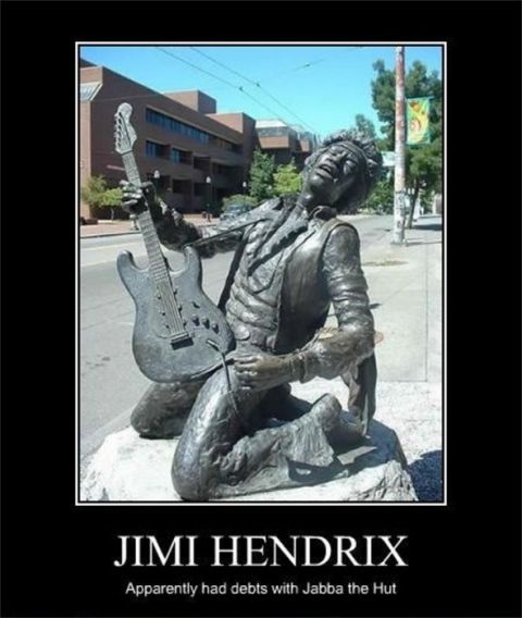 1978 Ford Bronco - A statue of Jimi Hendrix playing his guitar is displayed outdoors.