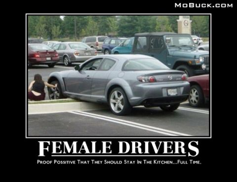 1978 Ford Bronco - A gray Mazda RX-8 is parked poorly in a parking lot, with a woman attempting to adjust it.