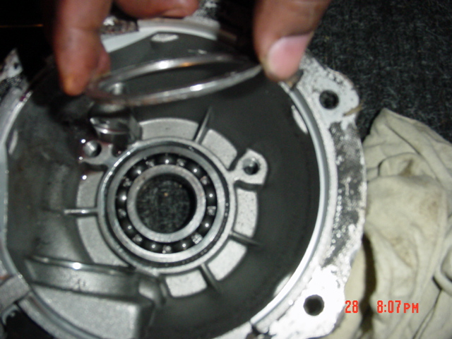 It is the backing fir the bearing....it popped right off