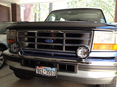 1996 Ford Bronco - Front view of a 1996 Ford Bronco, KC auxiliary lights and a Texas license plate.