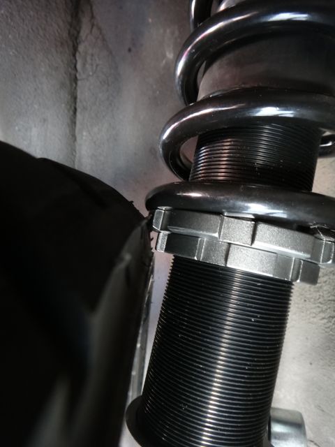 1995 Ford Taurus - Adjustable coilover shock absorber assembly, likely for aftermarket suspension upgrade.