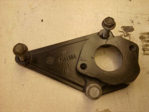 2005 Honda CR125R - A black GM part, identified by the number 12561584, is shown with two bolts.