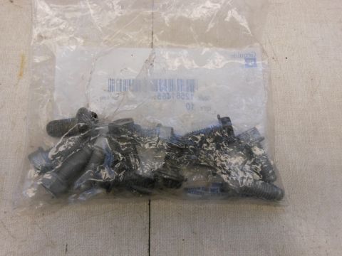 2005 Honda CR125R - A plastic bag contains a collection of bolts and fasteners, with some text visible on the packaging.