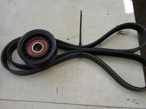 2005 Honda CR125R - A serpentine belt and its corresponding pulley are shown secured with a black zip tie.
