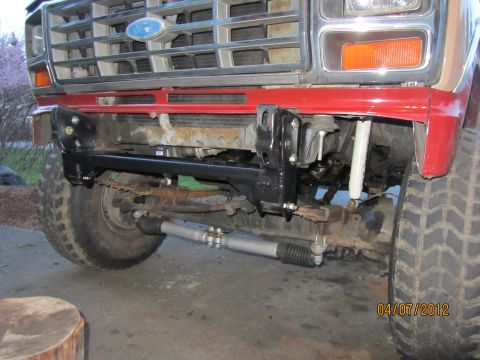 1984 Ford Bronco - Front view of a Ford Bronco, showing grille and suspension modifications.