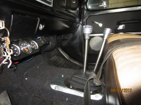 1979 Ford Bronco - Interior of a 1979 Ford Bronco, dual shifters and aftermarket gauges.