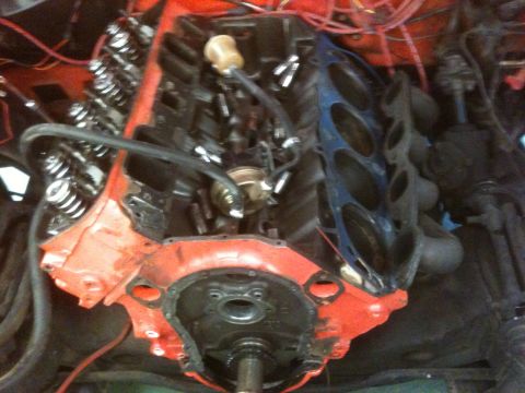 1968 Chevrolet Camaro - Engine block with valve covers and a removed intake manifold gasket is visible.
