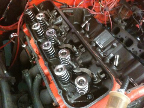 1968 Chevrolet Camaro - Engine internals exposed, showing valve springs and rocker arms after valve cover removal.